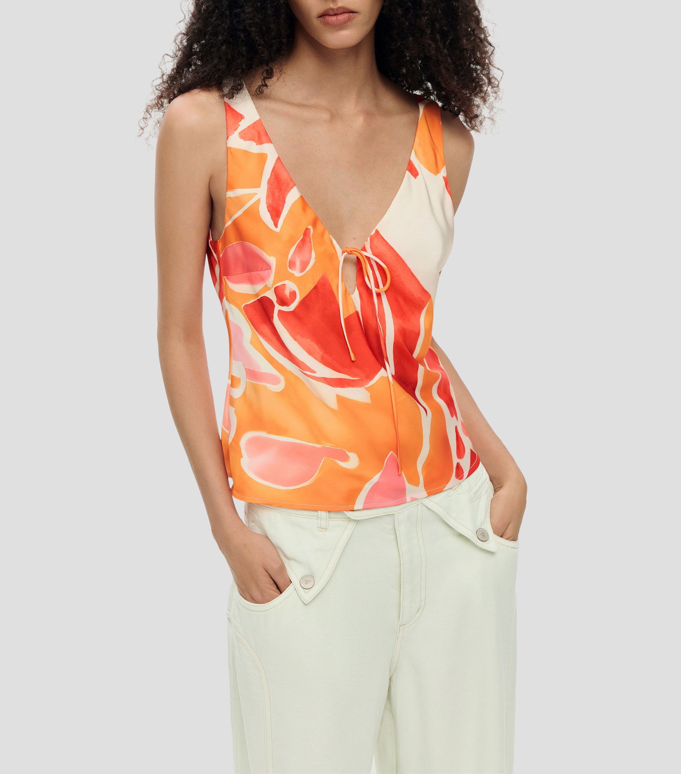 Blusa estampada sin mangas Mujer